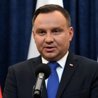 Poland president Andrzej Duda signs controversial Holocaust bill into law